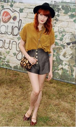 Florence Welch worked some leather shorts with a Topshop mustard blouse and