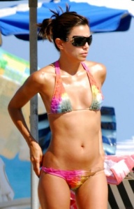 Eva Parker Longoria brightens up the beach in her tye dye ruffle bikini